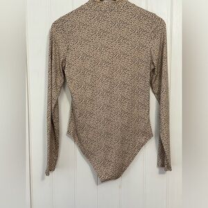 Women’s animal print body suit